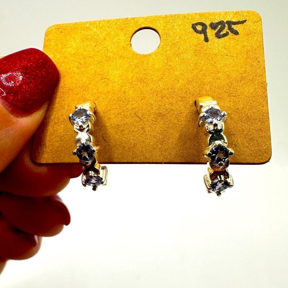 Round cut tanzanites in sterling‎ silver half hoop earrings!